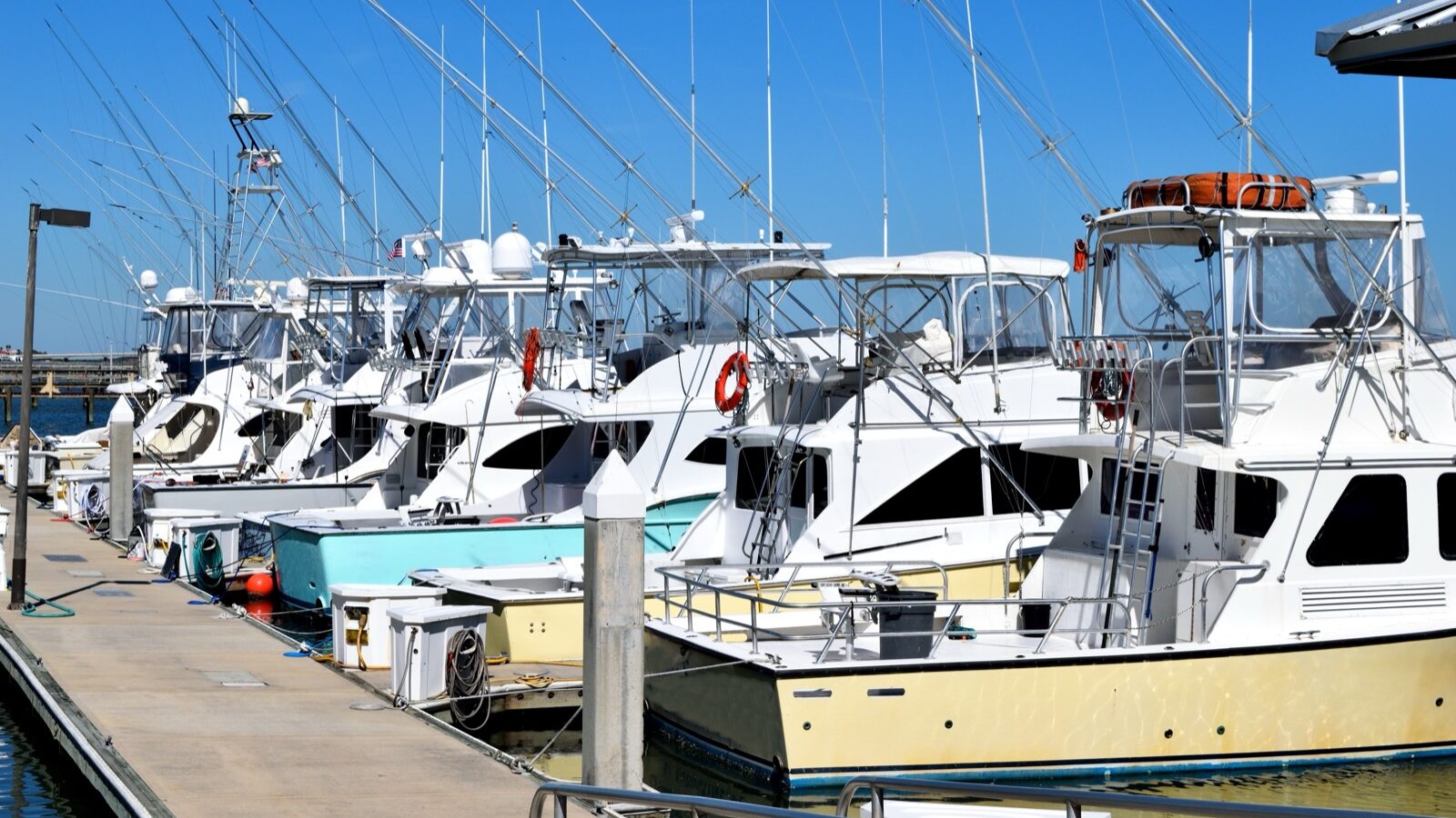 Fishing boats moored at a marina dock in St. Augustine, Florida.