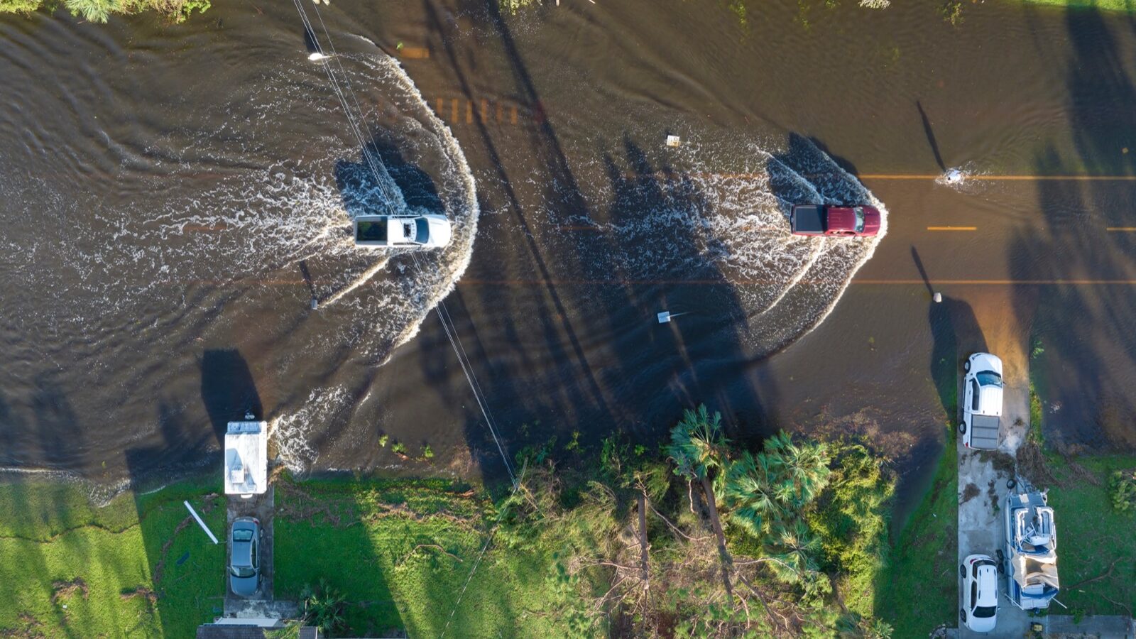 Floodwater standing across a residential street in Florida.