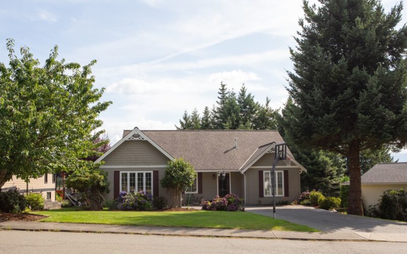A two-storey house in a residential neighborhood.