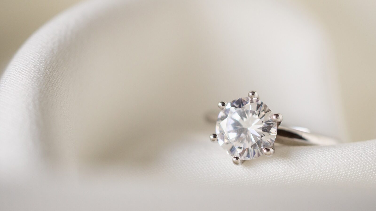 A diamond ring photographed in close-up.