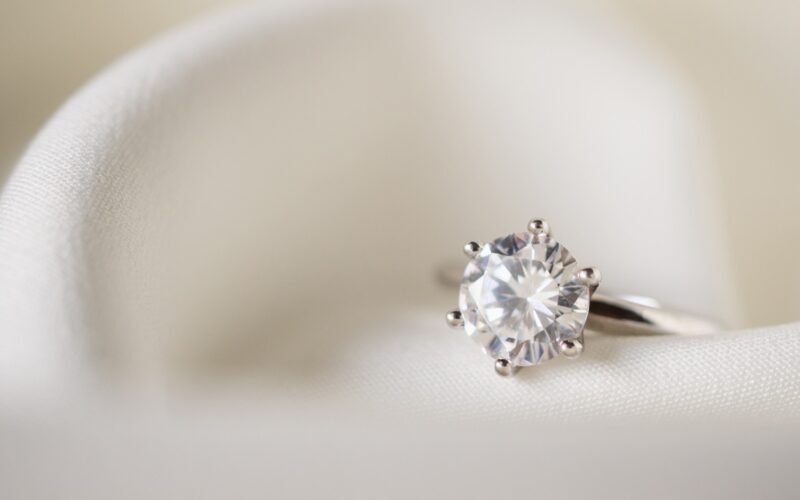 A diamond ring photographed in close-up.
